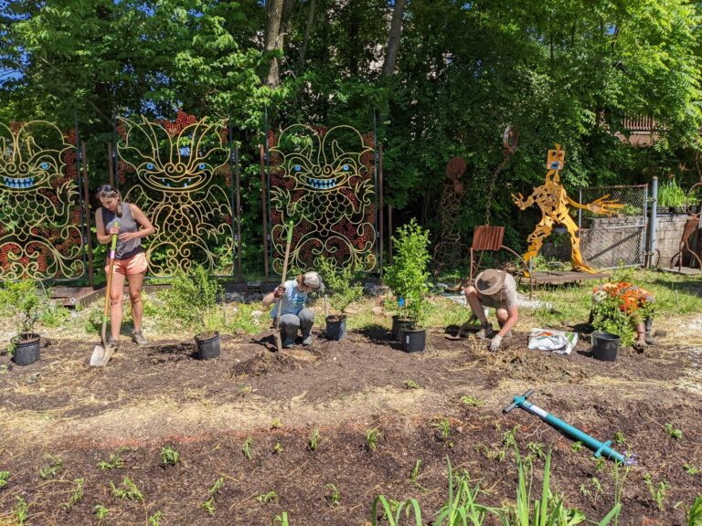 Volunteers planting trees at a NeighborSpace site